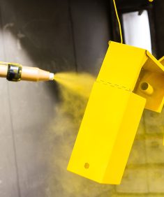 Powder coating metals to yellow colour