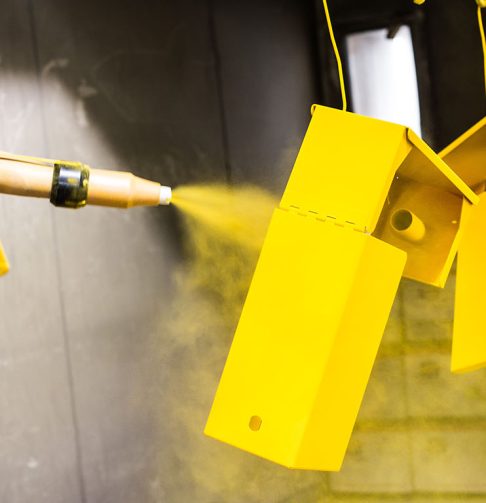 Powder coating metals to yellow colour